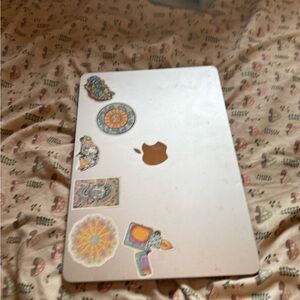 Apple MacBook with Artistic Stickers